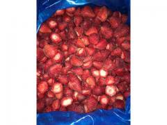 Frozen strawberries: dark red colour, cleaned and frozen